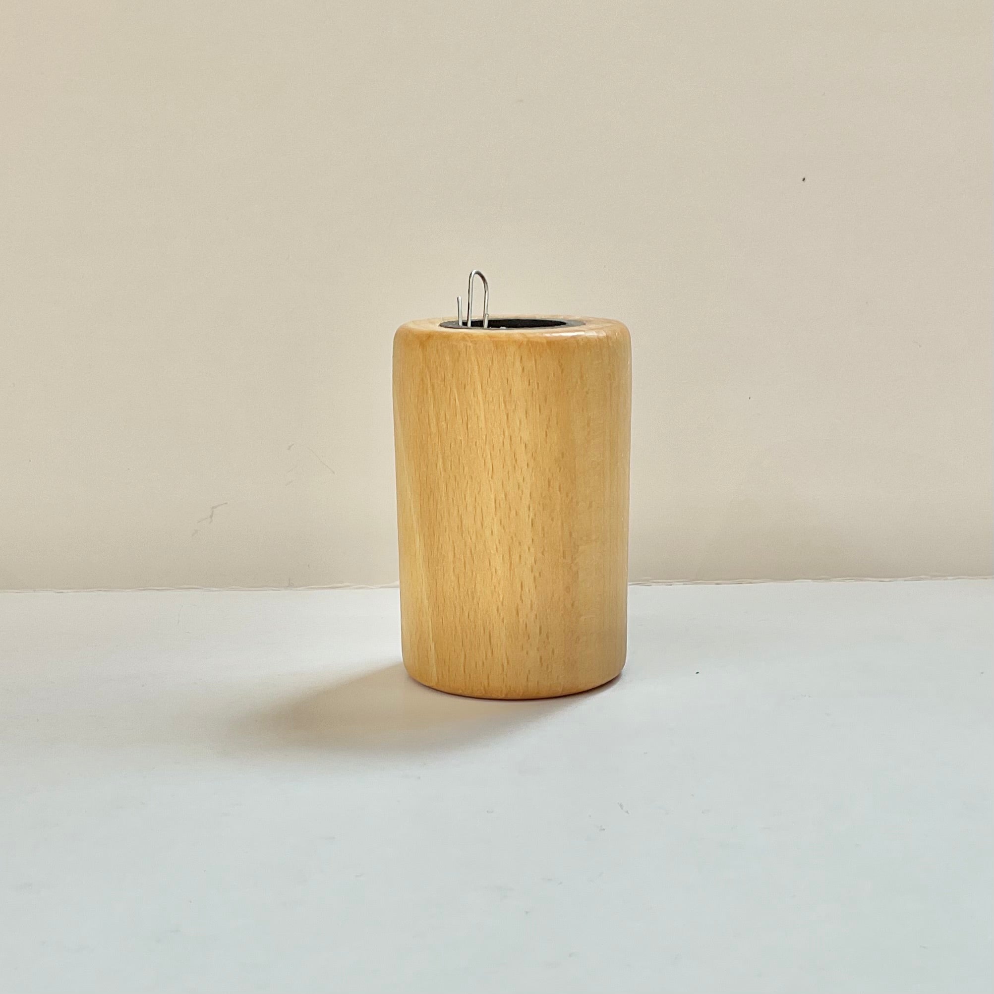 Wooden magnetic paperclip holder