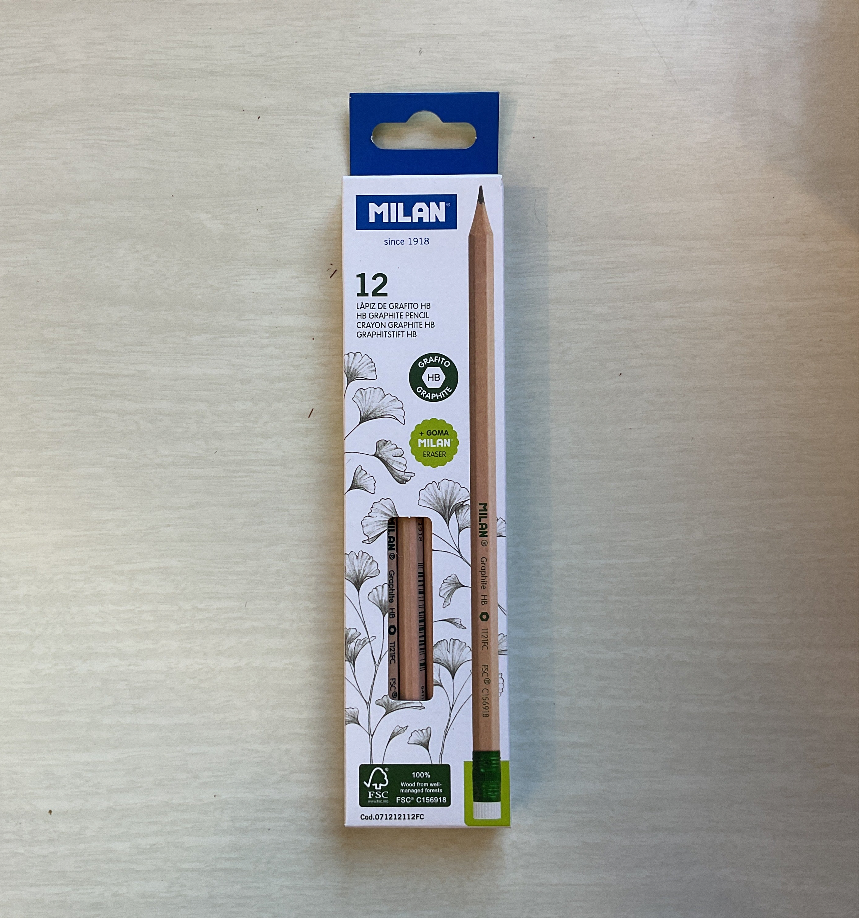 A pack of Milan HB graphite pencils with an eraser, displayed on a white background.