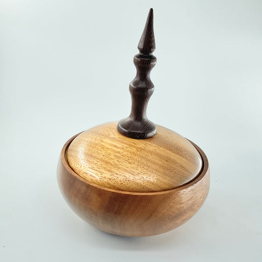 Teek jar with a lid