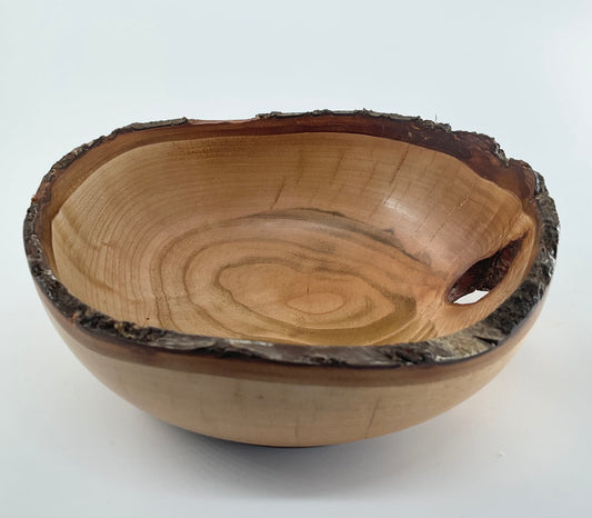 Small Bowl with a hole made from Cherry