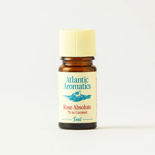 Bottle of Atlantic Aromatics Rose Absolute essential oil on a white background