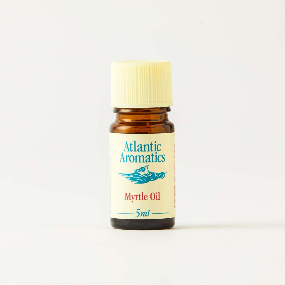 Bottle of Atlantic Aromatics Myrtle Oil on a light beige background