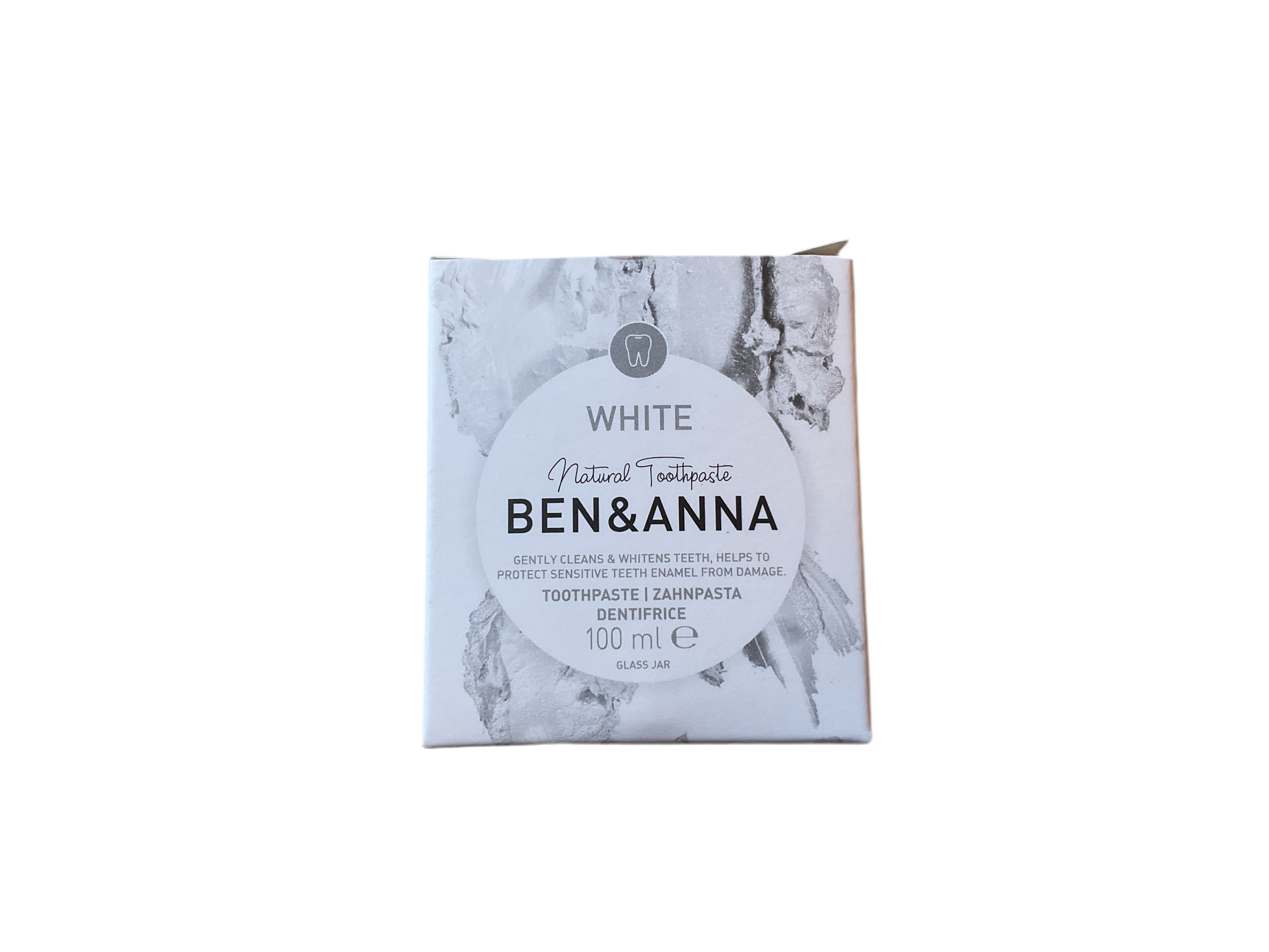 A box of Ben & Anna White Natural Toothpaste in a cardboard packaging with a white and grey color scheme.