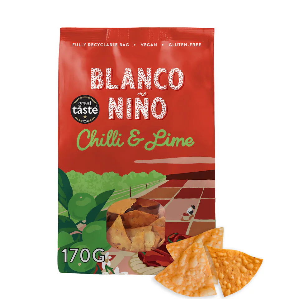 Red package of Blanco Nino Chilli & Lime chips with tortilla chips on a white background