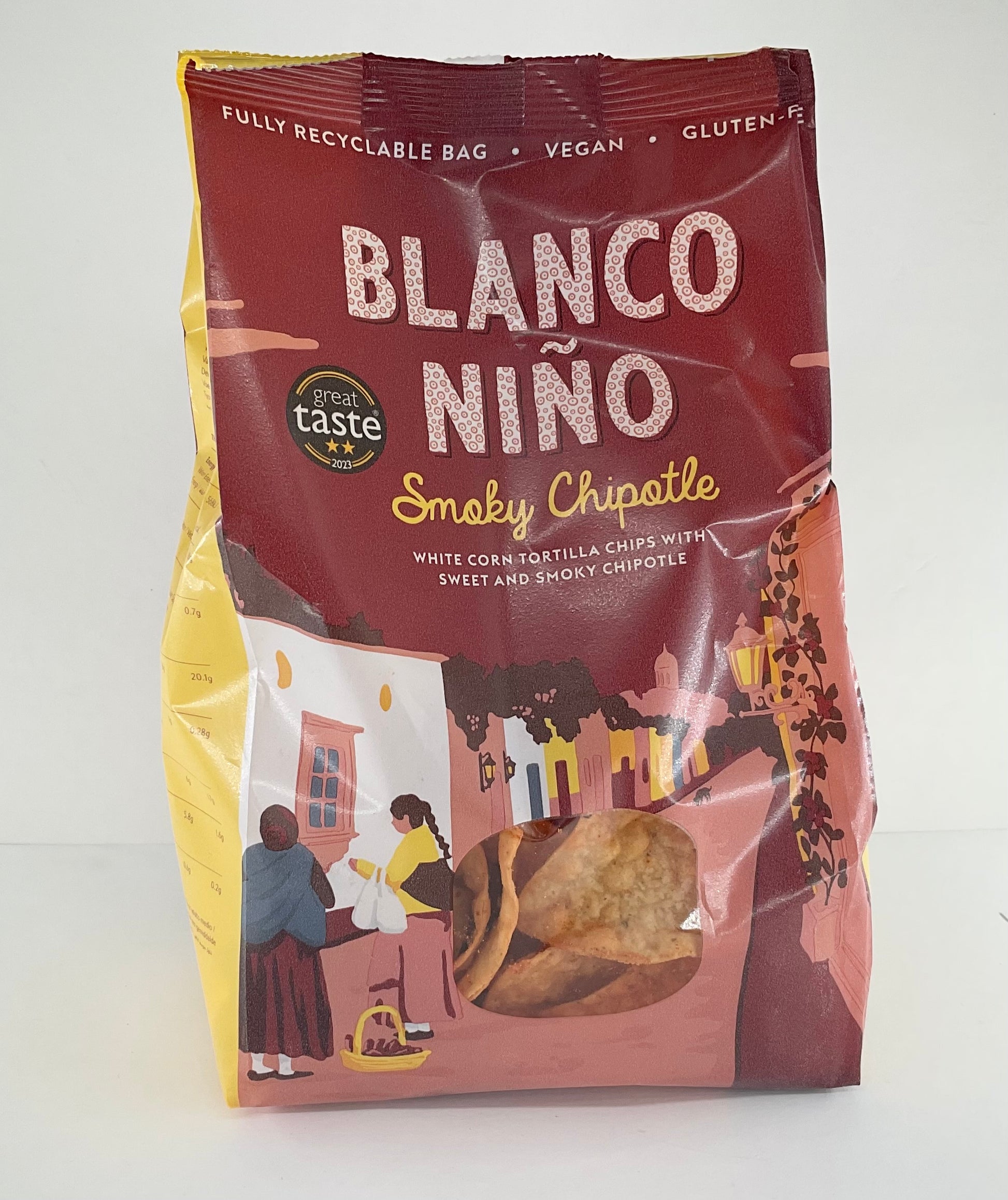 Bag of Blanco Nino Smoky Chipotle tortilla chips on a white background