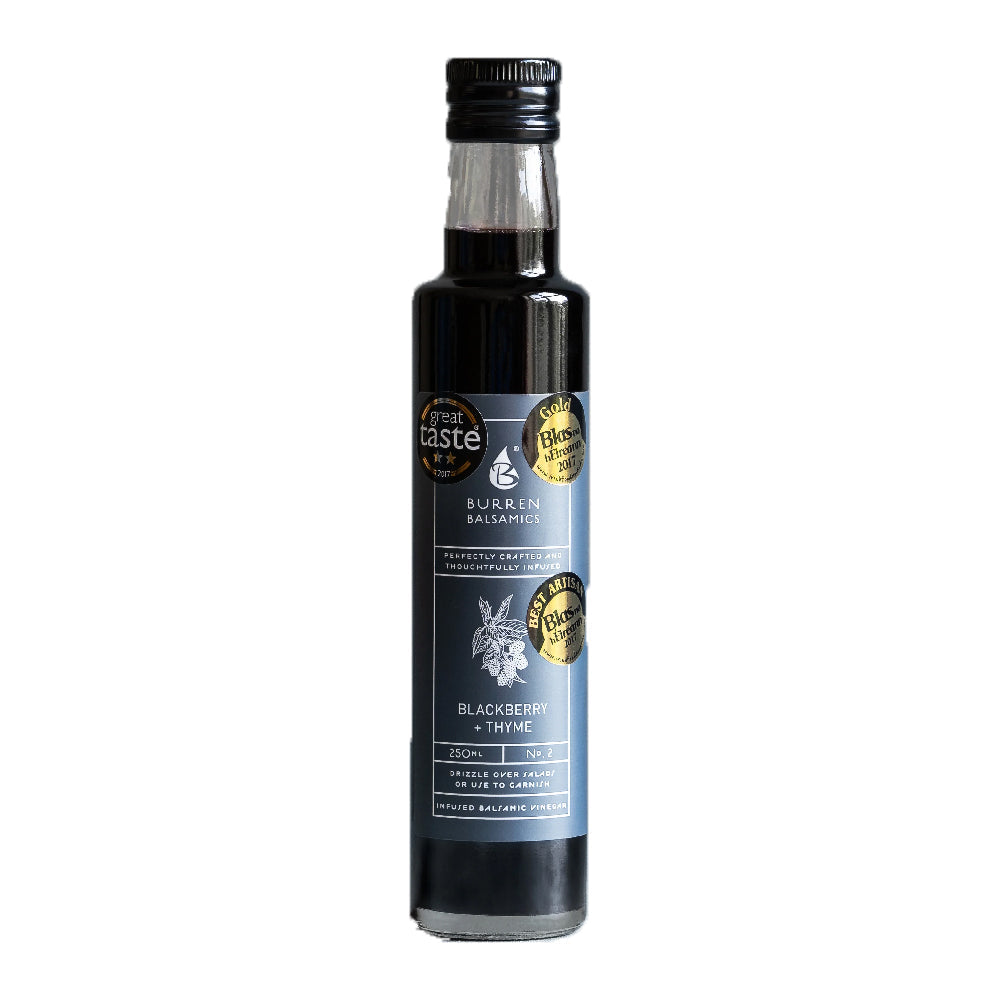 Bottle of Sunnyside Blackberry & Thyme balsamic vinegar on a white background