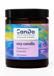 Soy candle with colorful label featuring 'CanDo' brand on a white background