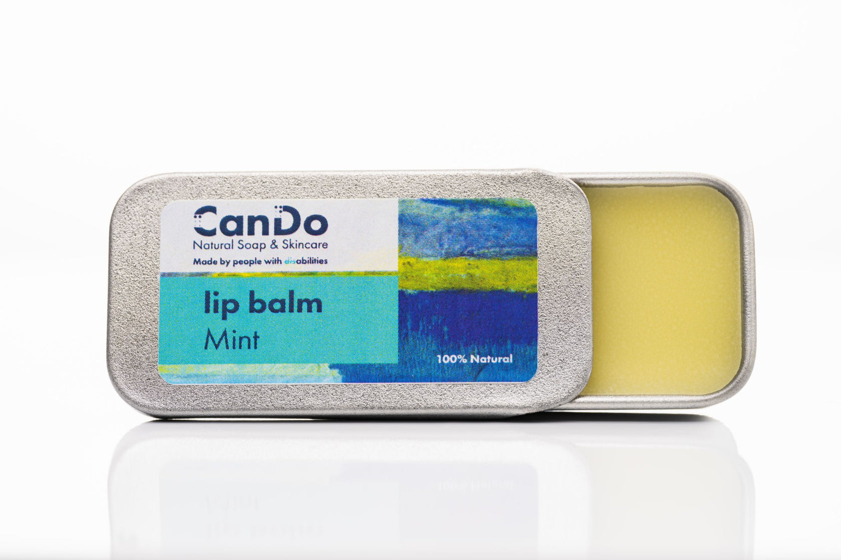 CanDo lip balm in a tin with a white background