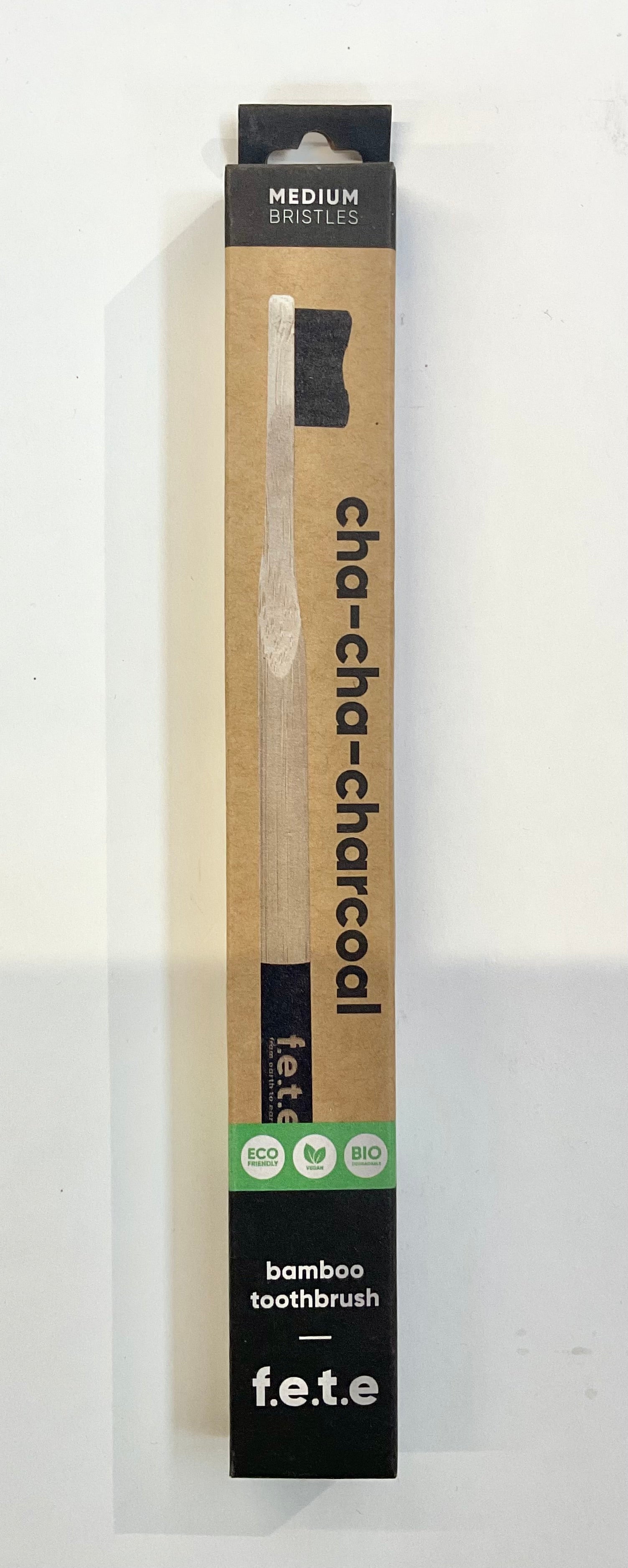 F.e.t.e. bamboo charcoal toothbrush packaging on a white background
