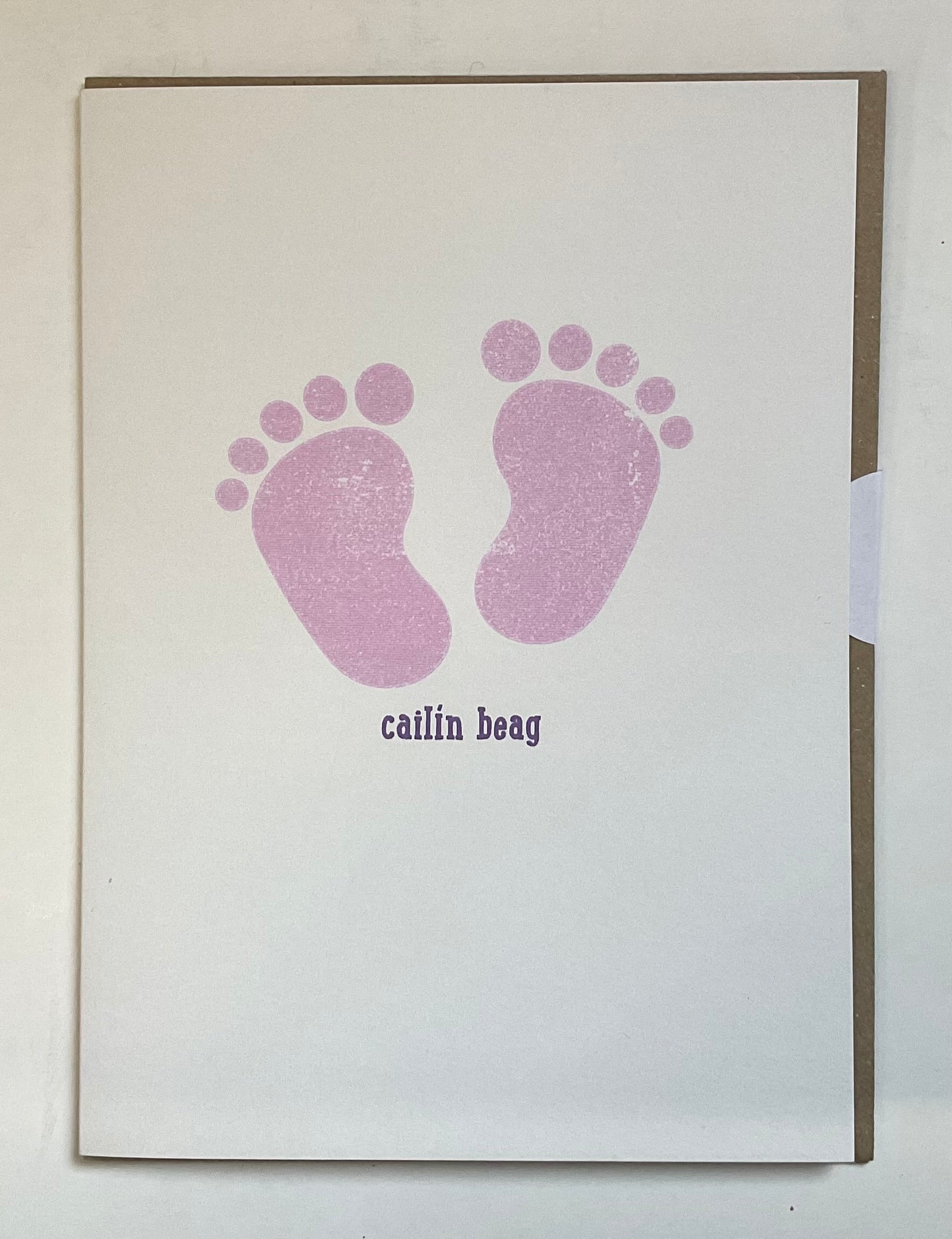 Card with purple footprints and text on a white background