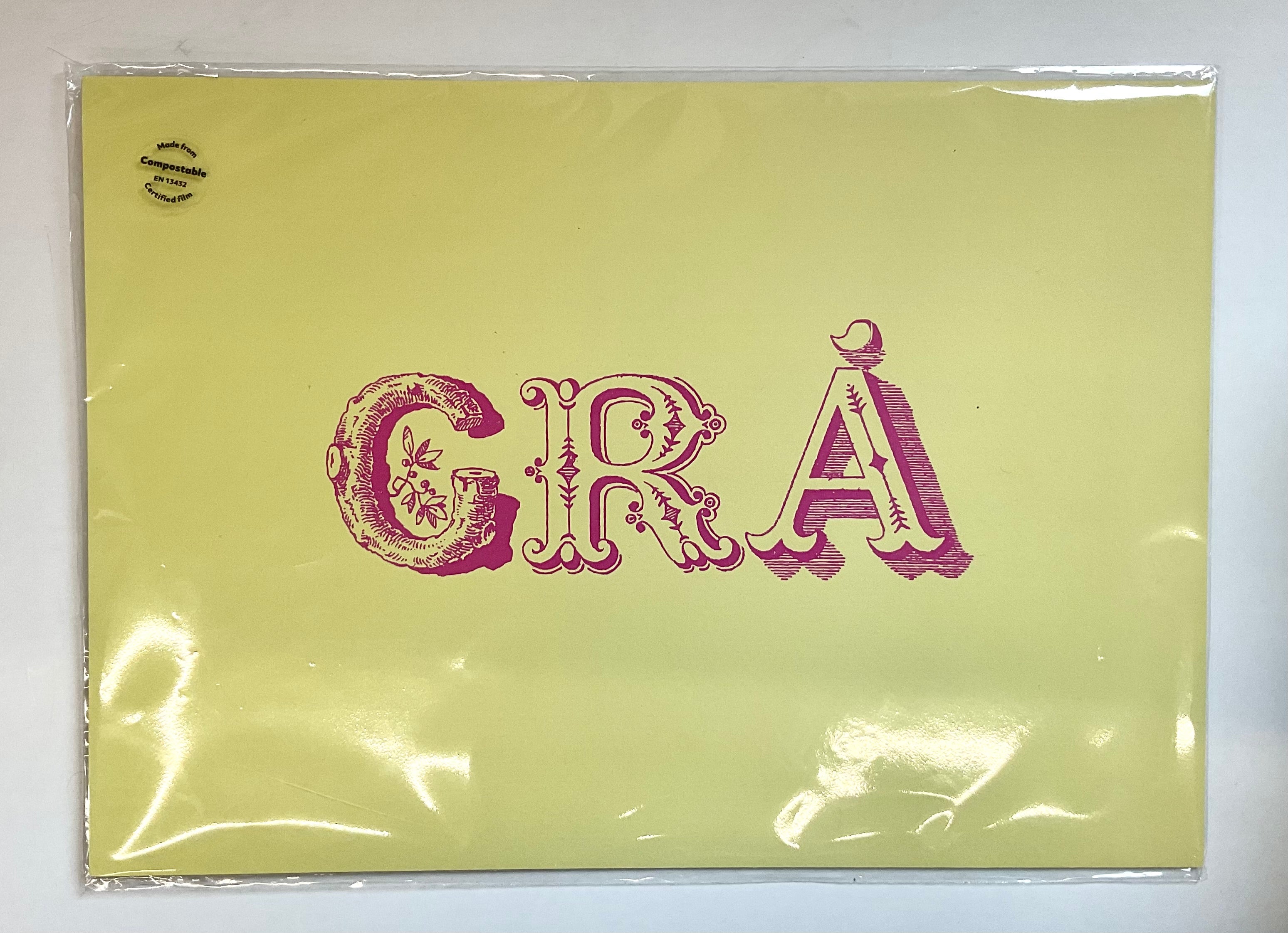 Packaged product with 'GRA' text on a yellow background
