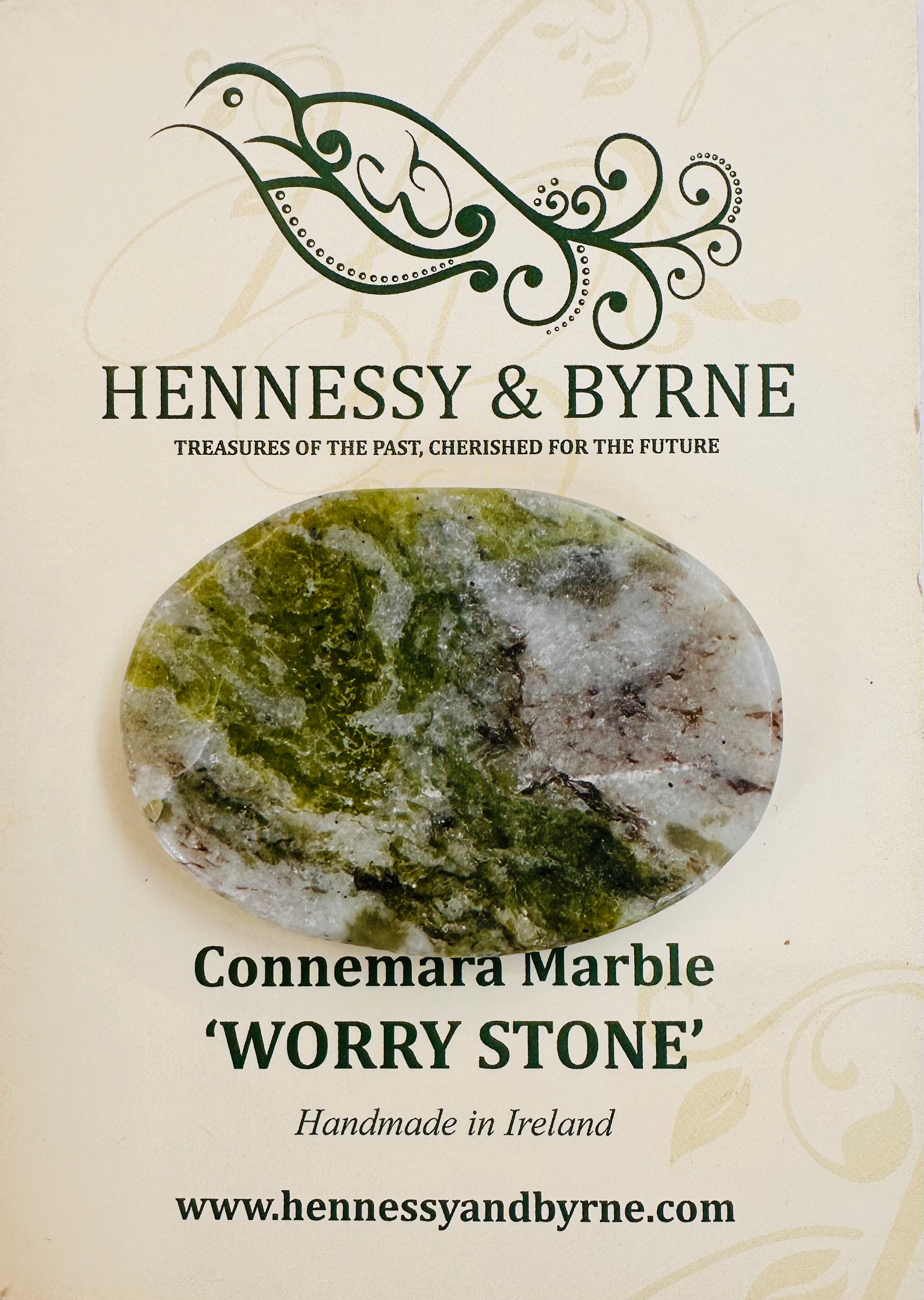Worry stone with Connemara Marble on a Hennessy & Byrne branded card.