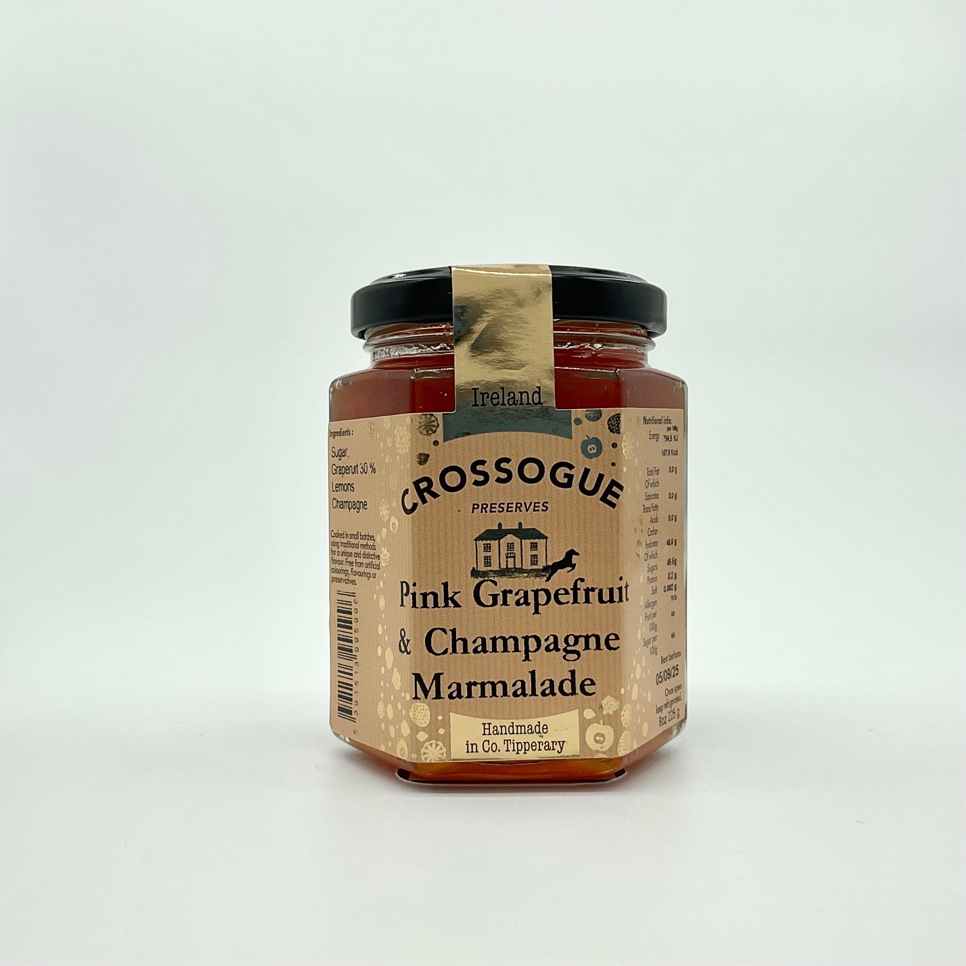 A jar of Crossogue Pink Grapefruit & Champagne Marmalade with a label and branding visible.