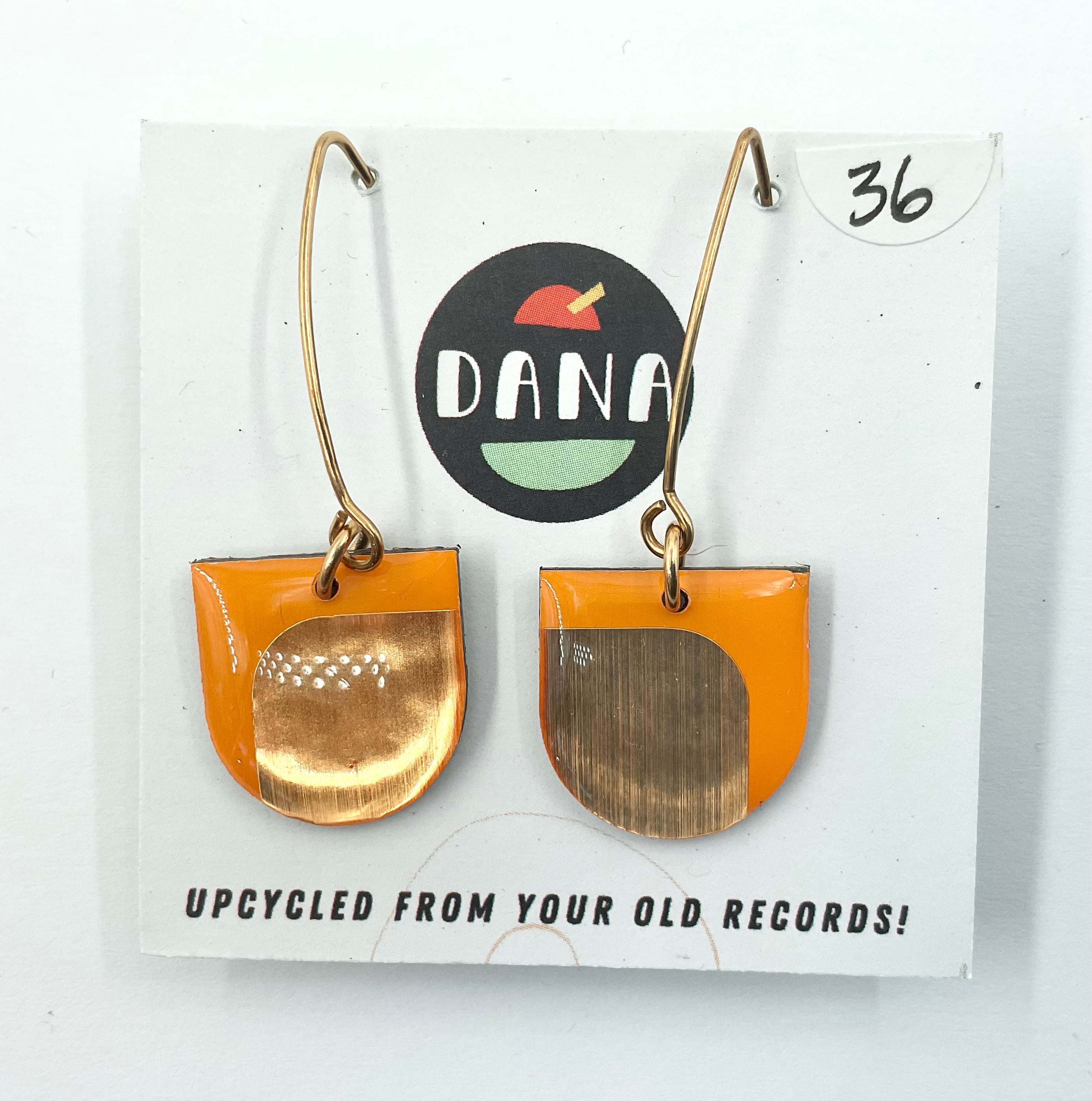 yellow and gold earrings from Dana jewellery with golden hooks