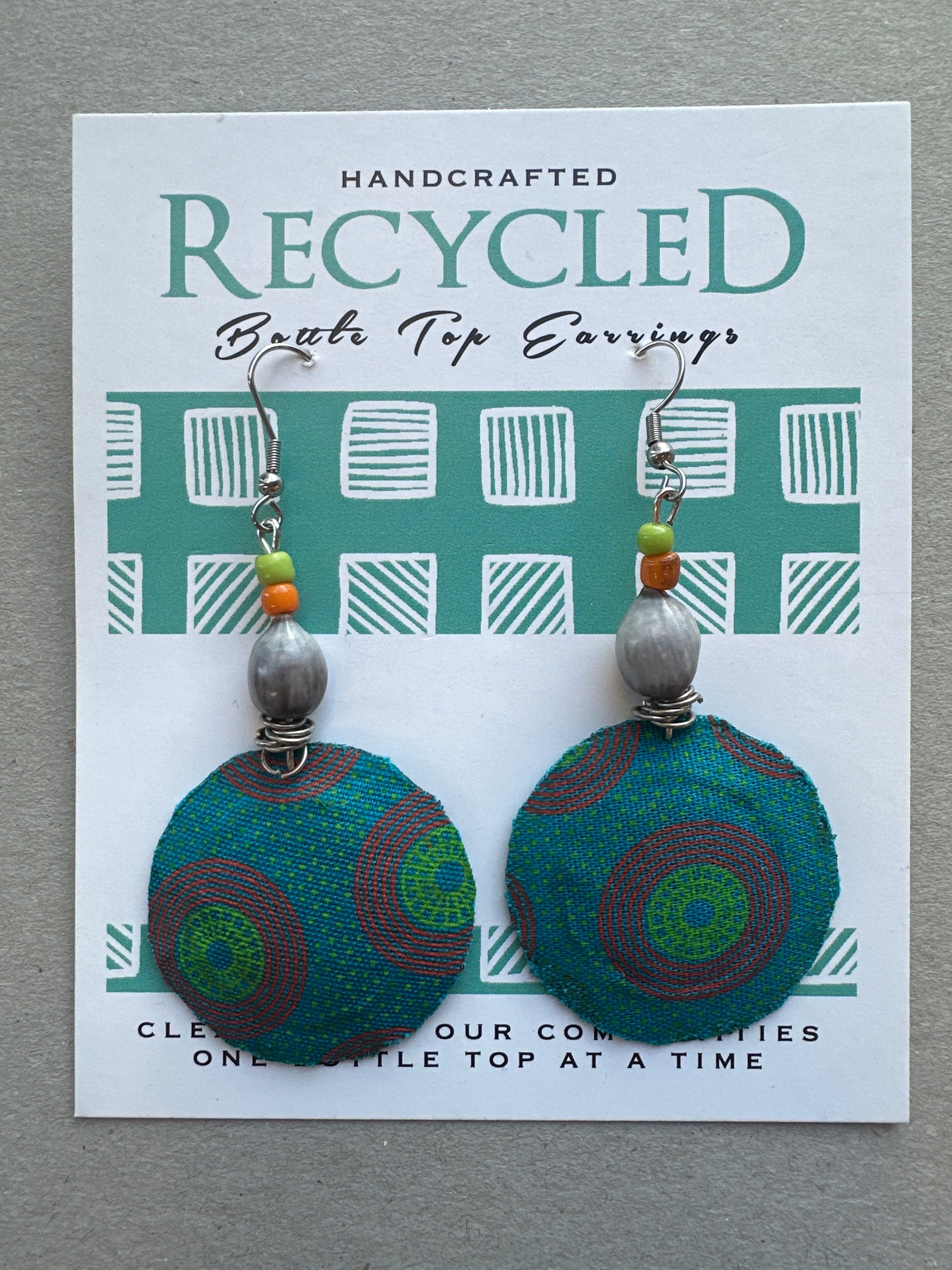 fabric covered earrings made from bottle tops