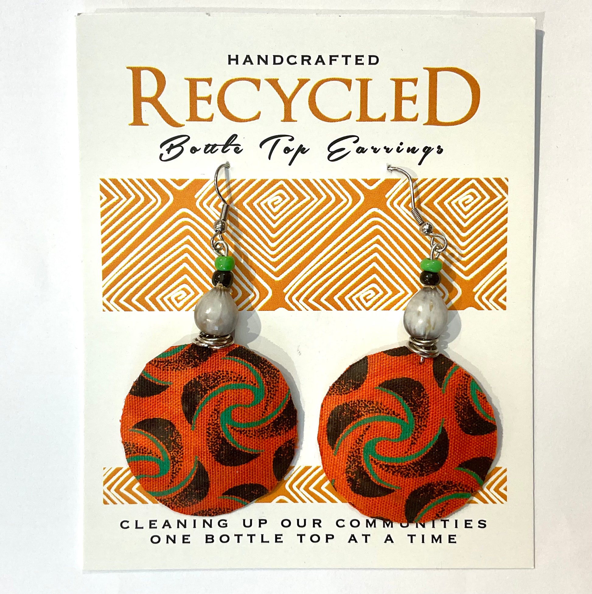 fabric covered earrings made from recycled bottle tops