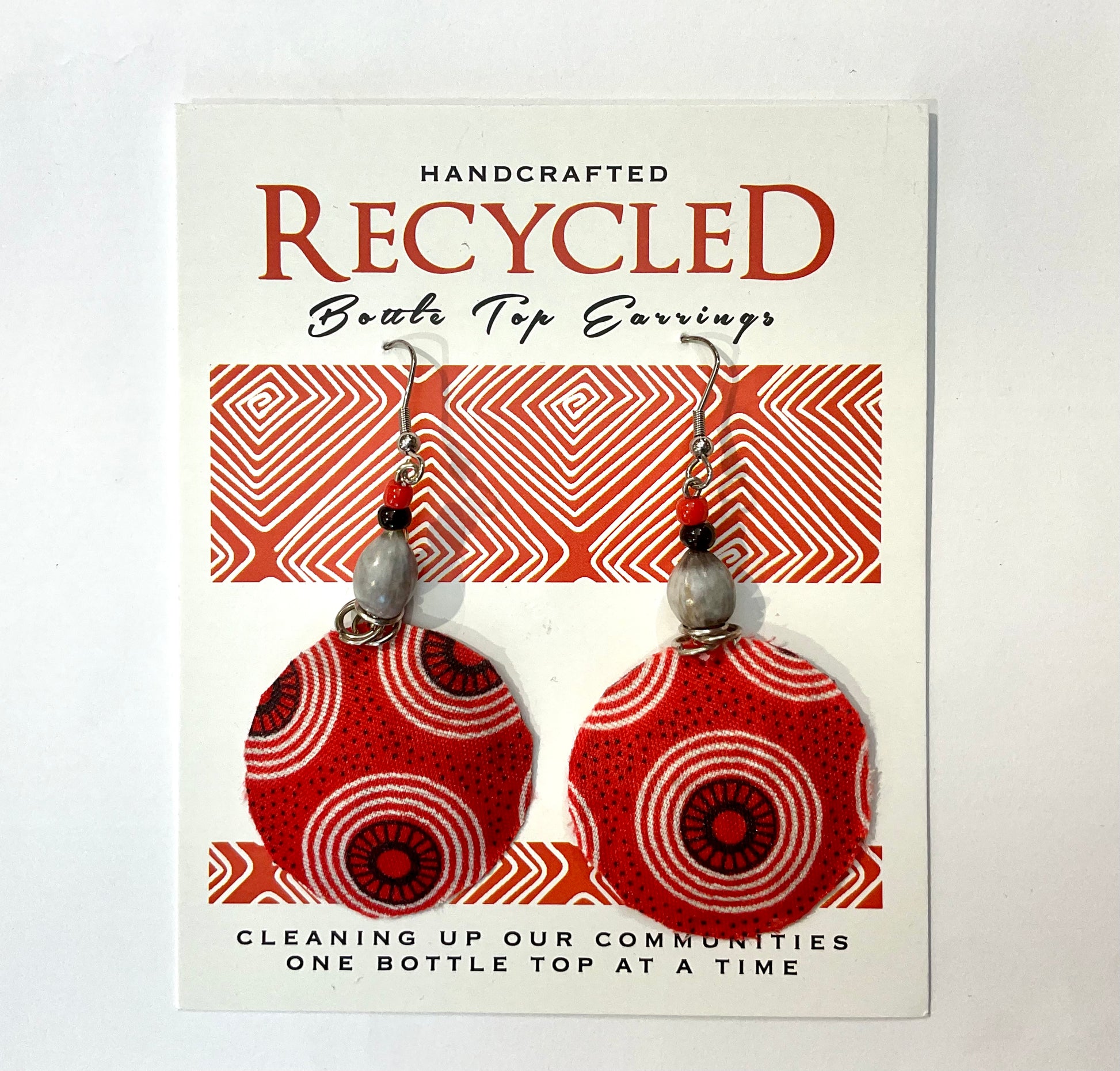 fabric covered earrings made from recycled bottle tops