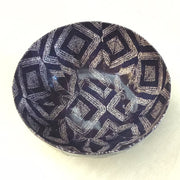 blue and white paper mache bowl