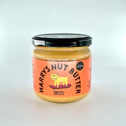 Jar of Harry's Nut Butter with a pink label on a white background