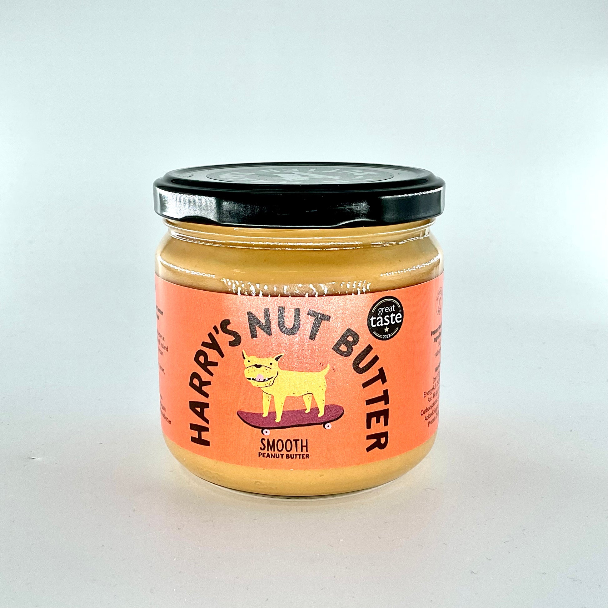 Jar of Harry's Nut Butter with a pink label on a white background