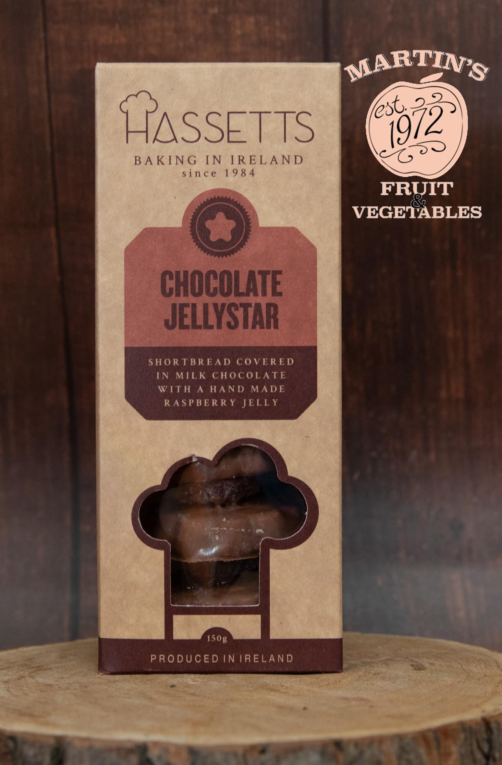 Hassetts Chocolate Jellystar packaging on a wooden surface with a blurred background