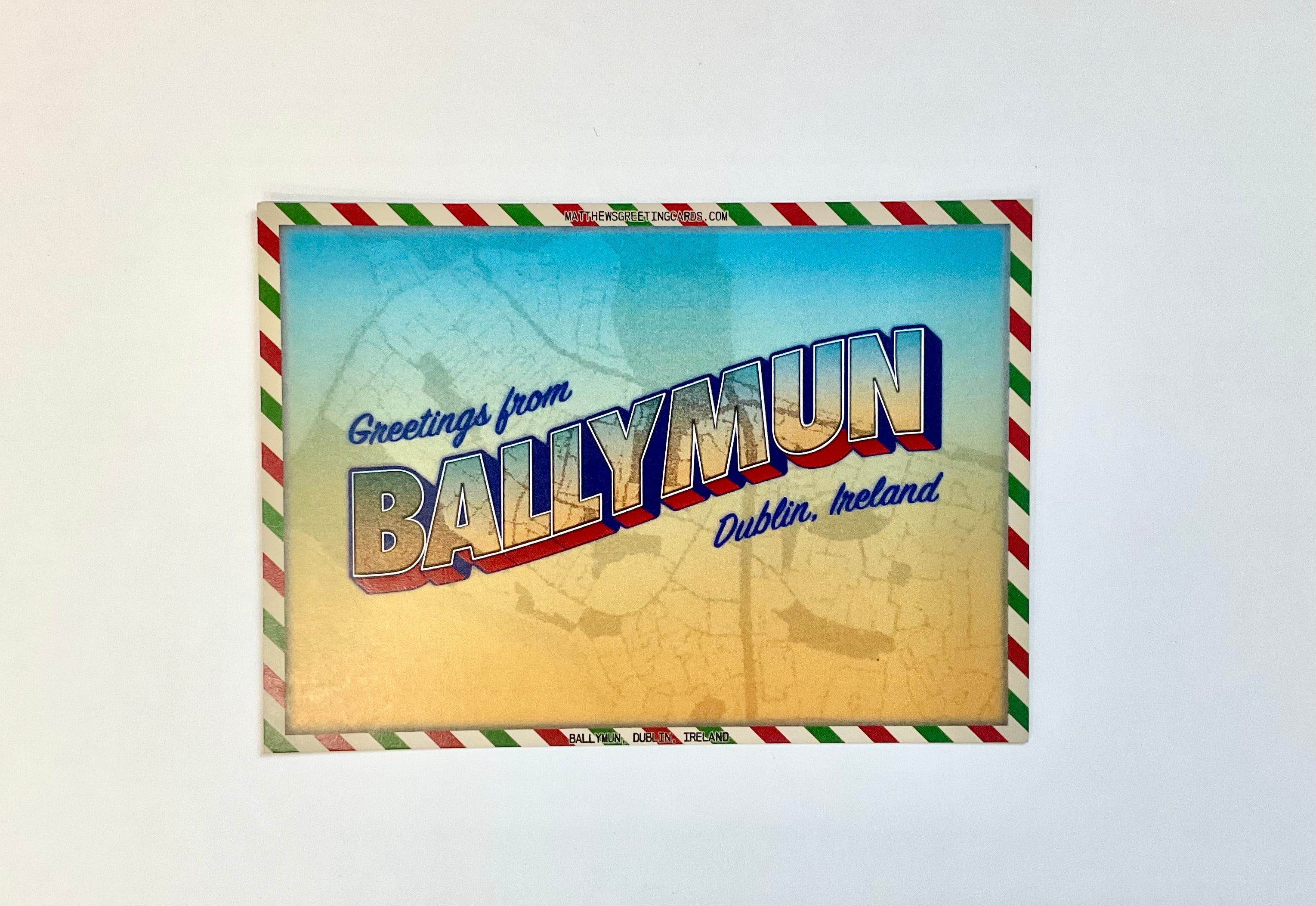 Postcard with 'Greetings from Ballymun, Dublin, Ireland' text on a scenic background
