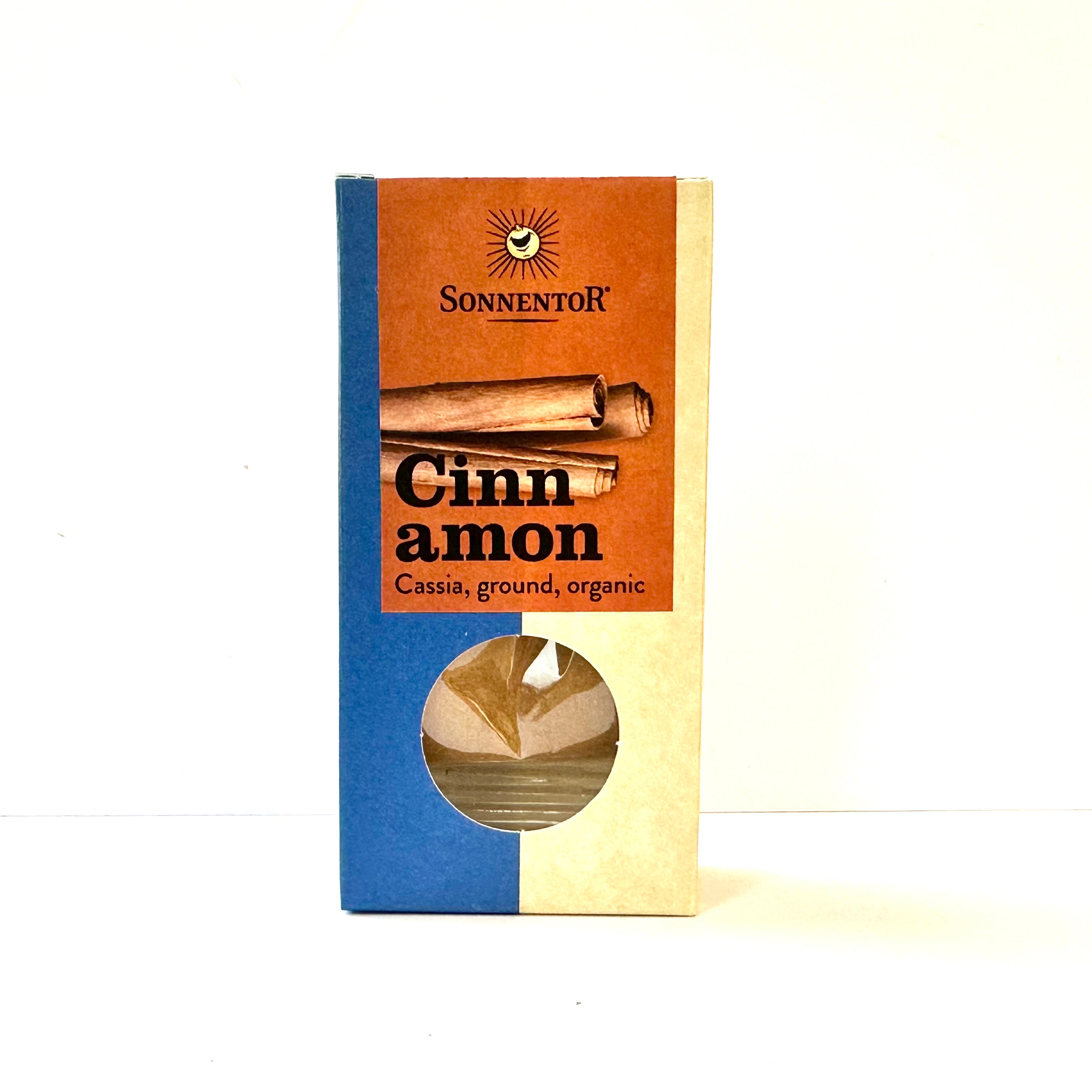Packaging of Sonnentor Organic Cassia Ground Cinnamon with a clear window showing the cinnamon powder inside.