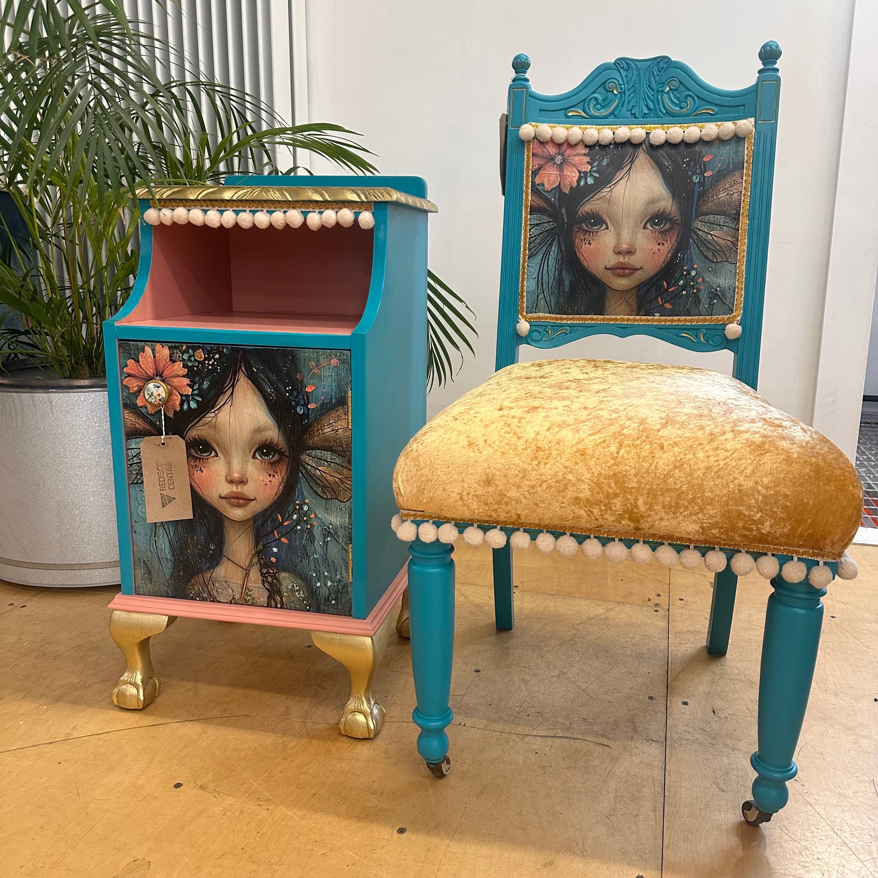 Decorative chair and cabinet with artistic designs on a wooden floor.