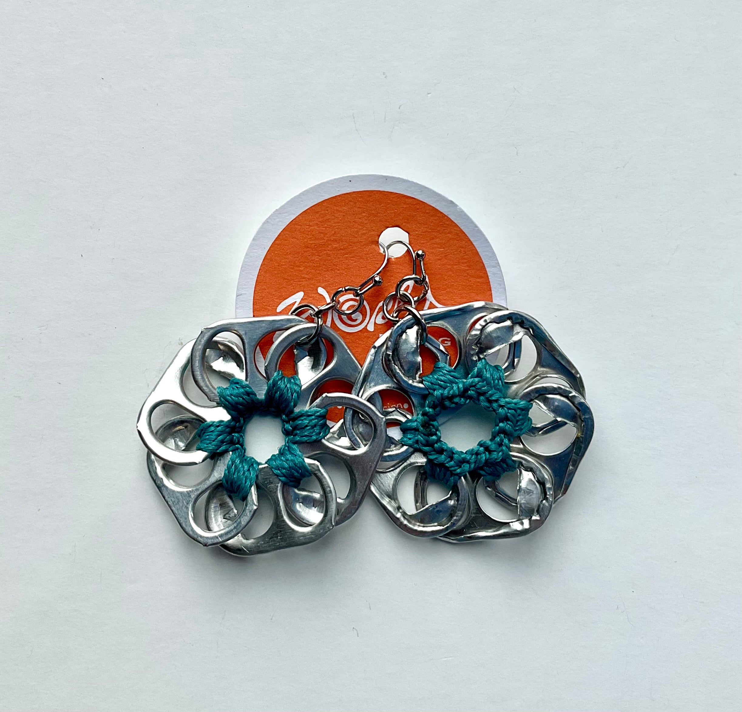 can pull earrings with teal thread