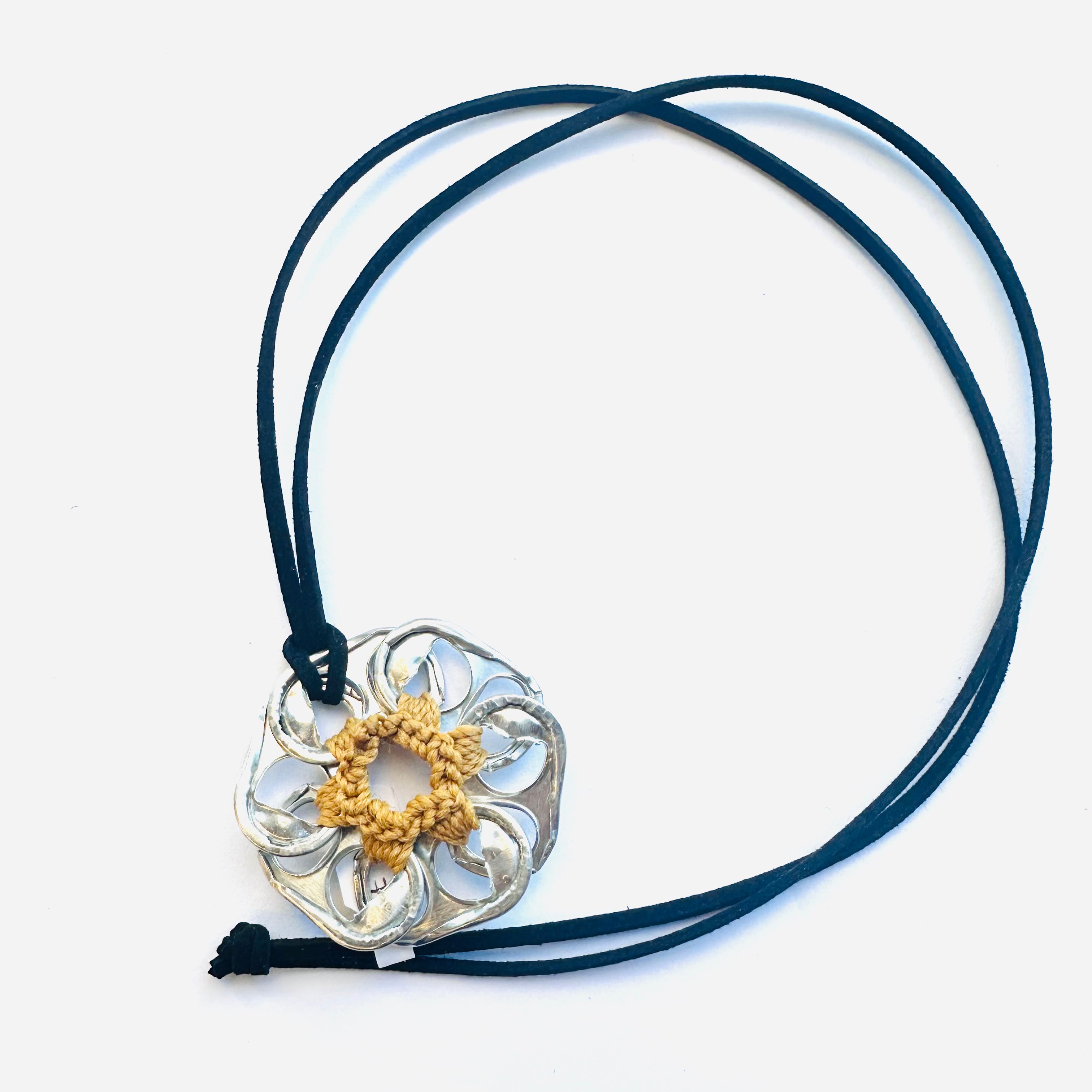 can pull necklace with black tie and yellow thread