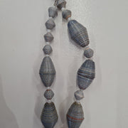 grey necklace handmade from magazines