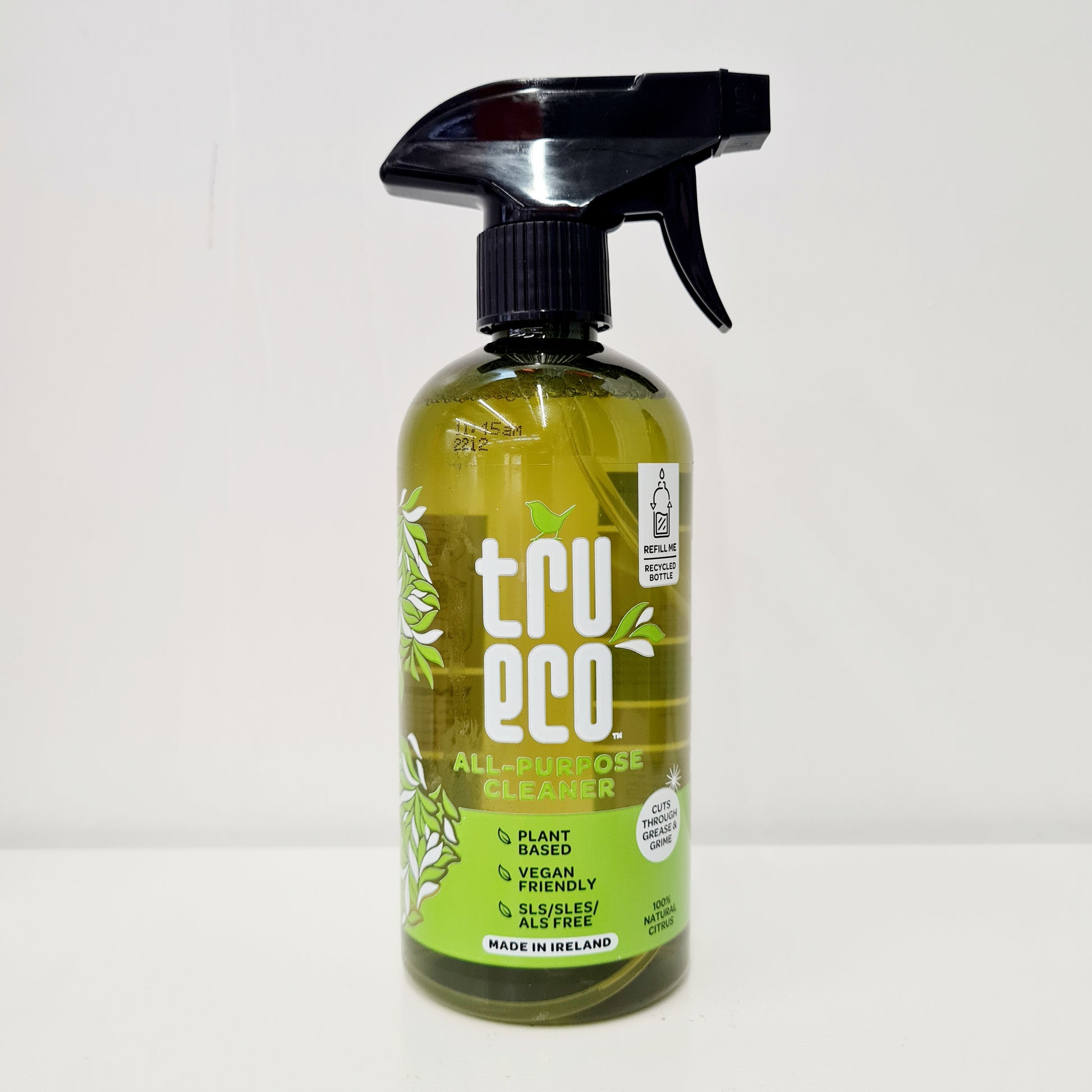 A bottle of TruEco All Purpose Cleaner with a spray nozzle, featuring green and yellow labeling and branding, placed against a white background.